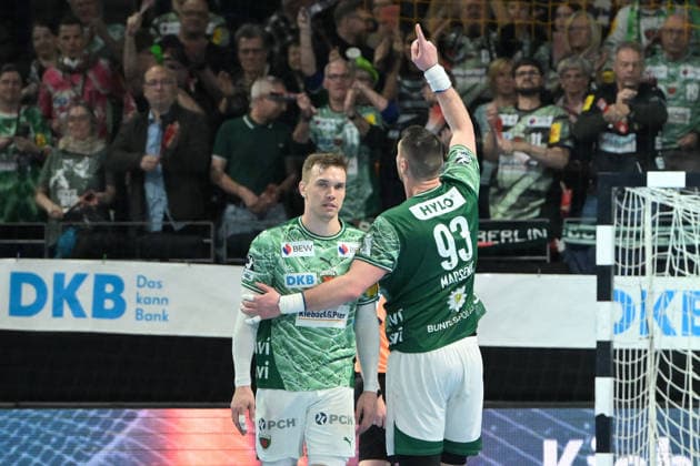 15.03.2026, xlakx, Handball Daikin HBL, Fuechse Berlin - HC Erlangen v.l. Lasse Andersson (Fuechse Berlin), Mijajlo Marsenic (Fuechse Berlin) Jubel ueber den Sieg, Jubel nach Spielende Berlin