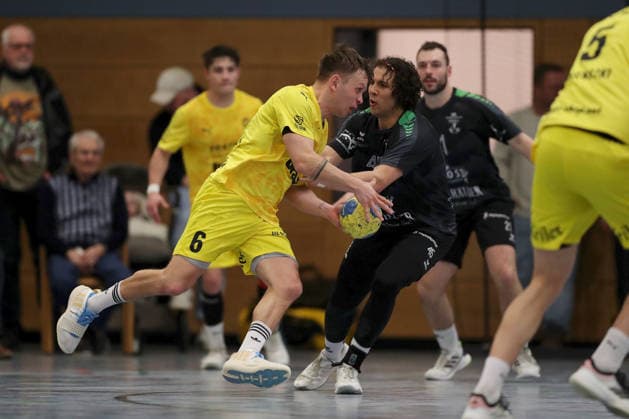 15.03.2026, Herren, Handball, Saison 2025 2026, Regionalliga, 19. Spieltag: DJK Waldbuettelbrunn - TSV Lohr Maximilian Schmitt ( 6, TSV Lohr) und Julian Hohmann ( 45, TSG Waldbüttelbrunn) Waldbuettelbrunn Ballsporthalle Bayern Deutschland