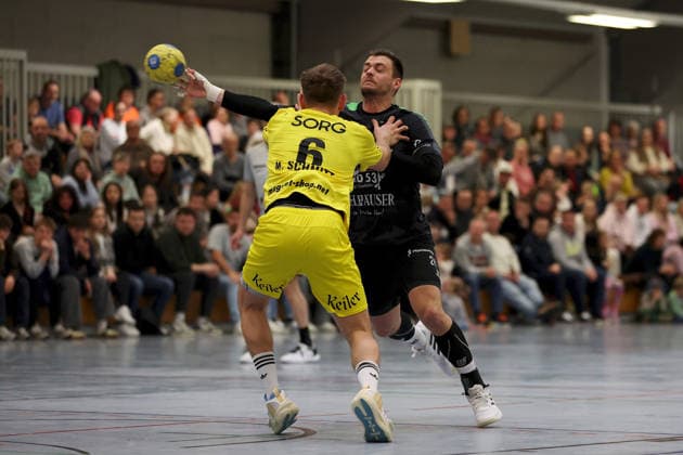 15.03.2026, Herren, Handball, Saison 2025 2026, Regionalliga, 19. Spieltag: DJK Waldbuettelbrunn - TSV Lohr Maximilian Schmitt ( 6, TSV Lohr) und Linus Dürr ( 24, TSG Waldbüttelbrunn) Waldbuettelbrunn Ballsporthalle Bayern Deutschland