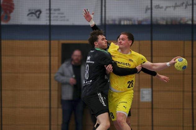 15.03.2026, Herren, Handball, Saison 2025 2026, Regionalliga, 19. Spieltag: DJK Waldbuettelbrunn - TSV Lohr Jannik Renz ( 18, TSG Waldbüttelbrunn) und Fabian Zehnter ( 28, TSV Lohr) Waldbuettelbrunn Ballsporthalle Bayern Deutschland