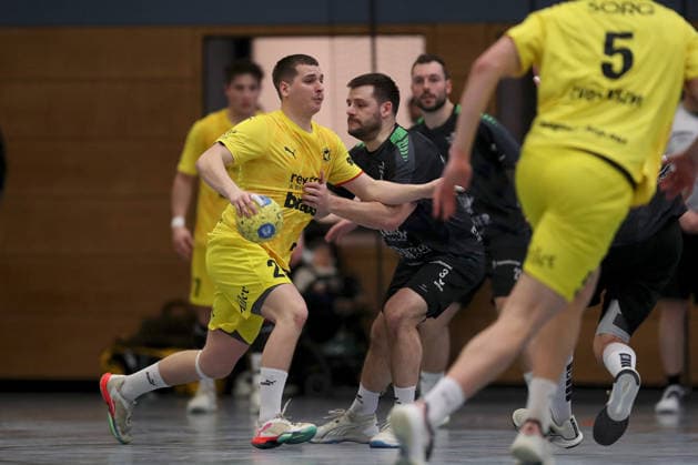 15.03.2026, Herren, Handball, Saison 2025 2026, Regionalliga, 19. Spieltag: DJK Waldbuettelbrunn - TSV Lohr Patrik Krisztian Dobos ( 25, TSV Lohr) und David Winheim ( 3, TSG Waldbüttelbrunn) Waldbuettelbrunn Ballsporthalle Bayern Deutschland