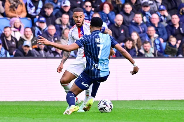 FOOTBALL : Le Havre vs Lyon - Ligue 1 - 15 03 2026 Corentin Tolisso of Lyon and Loic Nego of Le Havre during the Ligue 1 match between Havre AC and Olympique Lyonnais at Stade Oceane on March 15, 2026 in Le Havre, France. ( Photo by Federico Pestellini PsnewZ ) - Le HavreFrance  Copyright: xFedericoxPestellinix