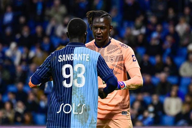 FOOTBALL : Le Havre vs Lyon - Ligue 1 - 15 03 2026 Arouna Sangante of Le Havre and Goalkeeper Mory Diaw of Le Havre during the Ligue 1 match between Havre AC and Olympique Lyonnais at Stade Oceane on March 15, 2026 in Le Havre, France. ( Photo by Federico Pestellini PsnewZ ) - Le HavreFrance  Copyright: xFedericoxPestellinix
