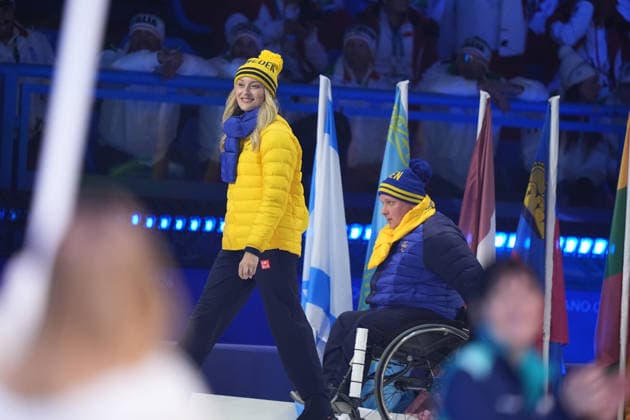 CORTINA, ITALY 20260315 Swedish flag bearers Marcus Holm and Ebba Arsjö enter during Sunday s closing ceremony for the Paralympics, in the Cortina curling stadium. *** The image is included in the SPORTS PACKAGE. For others PAYMENT IMAGE *** CORTINA ITALY x9200x *** CORTINA, ITALY 20260315 Swedish flag bearers Marcus Holm and Ebba Arsjö enter during Sunday s closing ceremony for the Paralympics, in the Cortina curling stadium The image is included in the SPORTS PACKAGE For others PAYMENT IMAGE CORTINA ITALY x9200x  Copyright: xBjörnxLarssonxRosvall TTx PARALYMPICS 2026 CONCLUSION