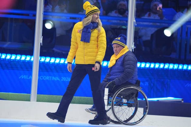 CORTINA, ITALY 20260315 Swedish flag bearers Marcus Holm and Ebba Arsjö enter during Sunday s closing ceremony for the Paralympics, in the Cortina curling stadium. *** The image is included in the SPORTS PACKAGE. For others PAYMENT IMAGE *** CORTINA ITALY x9200x *** CORTINA, ITALY 20260315 Swedish flag bearers Marcus Holm and Ebba Arsjö enter during Sunday s closing ceremony for the Paralympics, in the Cortina curling stadium The image is included in the SPORTS PACKAGE For others PAYMENT IMAGE CORTINA ITALY x9200x  Copyright: xBjörnxLarssonxRosvall TTx PARALYMPICS 2026 CONCLUSION