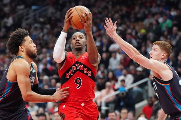 March 15, 2026, Toronto, On, Canada: Toronto Raptors forward RJ Barrett (9) controls the ball as Detroit Pistons guard Cade Cunningham, left, and Detroit Pistons guard Kevin Huerter (27) defend during first half NBA, Basketball Herren, USA basketball action in Toronto on Sunday, March 15, 2026. Canada News - March 15, 2026 - ZUMAc35_ 20260315_zaf_c35_086 Copyright: xFrankxGunnx