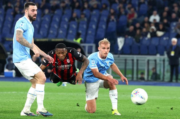 CALCIO - Serie A - SS Lazio vs AC Milan Rome, Italy - March 15, 2026: Pervis Estupinan (defender) of AC Mila, Gustav Isaksen (winger) of SS Lazio in seen in action during the Serie A Enilive 2025-2026 football match between S.S. Lazio vs A.C. Milan at Olympic Stadium. Rome Italy  Copyright: xIPAxSport ABACAx