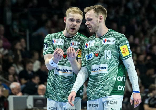 15.03.2026, xlakx, Handball Daikin HBL, Fuechse Berlin - HC Erlangen v.l. Matthes Langhoff (Fuechse Berlin), Mathias Gidsel (Fuechse Berlin) im Gespraech Berlin