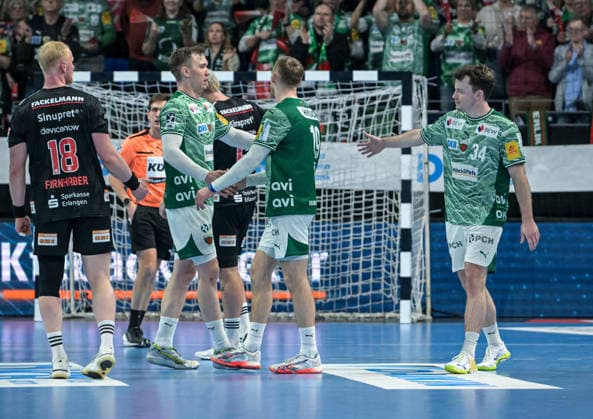 15.03.2026, xlakx, Handball Daikin HBL, Fuechse Berlin - HC Erlangen v.l. Sebastian Firnhaber (HC Erlangen), Lasse Andersson (Fuechse Berlin), Mathias Gidsel (Fuechse Berlin), Hakun West Av Teigum (Fuechse Berlin) Jubel ueber den Sieg, Jubel nach Spielende Berlin