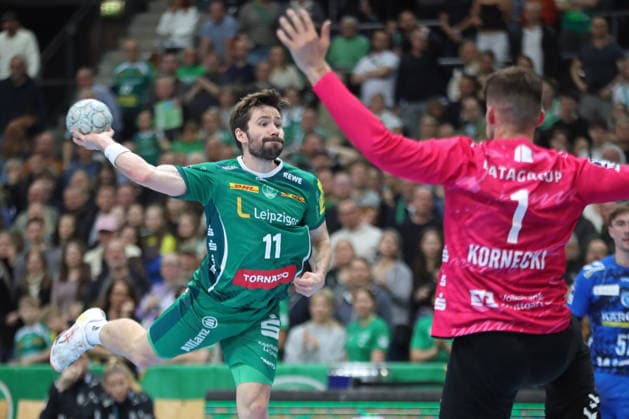 Handball DAIKIN HBL, SC DHfK Leipzig - TVB Stuttgart; 15.03.2026 Lukas Binder (11, SC DHfK Leipzig) wirft gegen Torwart Mateusz Kornecki (1, TVB Stuttgart). Handball, DAIKIN HBL, 1. Bundesliga, Saison 2025 2026, 25. Spieltag: SC DHfK Leipzig vs. TVB Stuttgart am 15.03.2026 in der Quarterback Immobilien Arena Leipzig. Copyright: xBEAUTIFULxSPORTS JanxKaeferx