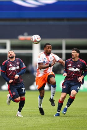 March 15, 2026; Foxborough, Massachusetts, USA; New England Revolution midfielder Diego Fagundez (77) reacts after being hit in the head with the ball in a Major League Soccer game between the New England Revolution and FC Cincinnati at Gillette Stadium. (c) CSM - ZUMAc04_ 20260315_zma_c04_023 Copyright: xBurtxGranofskyx