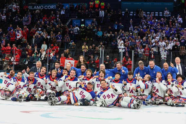 March 15, 2026, Milan, Lombardy, Italy: Team USA players of whom hat-trick goal scorer JACK WALLACE, tournament Mvp DECLAN FARMER, captain JOSH PAULS and goalie GRIFFIN LAMARRE celebrate with their gold medals after the Final game between Team United States (USA) and Team Canada (CAN) at the Milano Cortina 2026 Paralympic Winter games, Winterspiele,Spiele, Summer games Team USA won 6:2 and their fifth consecutive Para Ice hockey, Eishockey Milan Italy - ZUMAc179 20260315_oly_c179_133 Copyright: xMickaelxChavetx