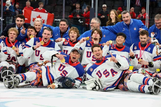 March 15, 2026, Milan, Lombardy, Italy: Team USA players of whom hat-trick goal scorer JACK WALLACE and goalie GRIFFIN LAMARRE celebrate with their gold medals after the Final game between Team United States (USA) and Team Canada (CAN) at the Milano Cortina 2026 Paralympic Winter games, Winterspiele,Spiele, Summer games Team USA won 6:2 and their fifth consecutive Para Ice hockey, Eishockey Milan Italy - ZUMAc179 20260315_oly_c179_135 Copyright: xMickaelxChavetx