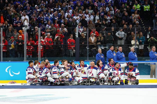 March 15, 2026, Milan, Lombardy, Italy: Team USA players of whom captain JOSH PAULS celebrate with their gold medals after the Final game between Team United States (USA) and Team Canada (CAN) at the Milano Cortina 2026 Paralympic Winter games, Winterspiele,Spiele, Summer games Team USA won 6:2 and their fifth consecutive Para Ice hockey, Eishockey Paralympics 2026: Milano Cortina: USA Make It Five-In-A-Row In Sled Hockey  - ZUMAc179 20260315_oly_c179_137 Copyright: xMickaelxChavetx