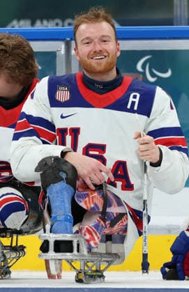 March 15, 2026, Milan, Lombardy, Italy: DECLAN FARMER 16 of Team USA celebrates winning the gold medal in the Final game between Team United States (USA) and Team Canada (CAN) at the Milano Cortina 2026 Paralympic Winter games, Winterspiele,Spiele, Summer games Team USA won 6:2 and their fifth consecutive Para Ice hockey, Eishockey Paralympics 2026: Milano Cortina: USA Make It Five-In-A-Row In Sled Hockey  - ZUMAc179 20260315_oly_c179_138 Copyright: xMickaelxChavetx