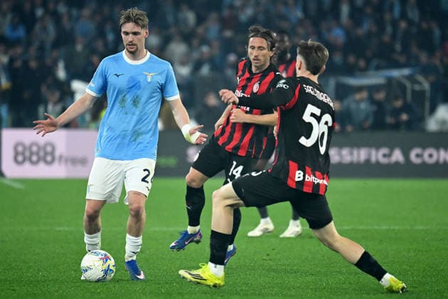 Kenneth Taylor of SS Lazio,Alexis Saelemaekers of AC Milan during the serie A Enilive match between SS Lazio v AC Milan at olimpico stadium in Rome, March 14th, 2026 Mattia Vian  Copyright: xMattiaxVian IPAxSportx xipa-agency.netx xx IPA_72957520 IPA_Agency_IPA72957520