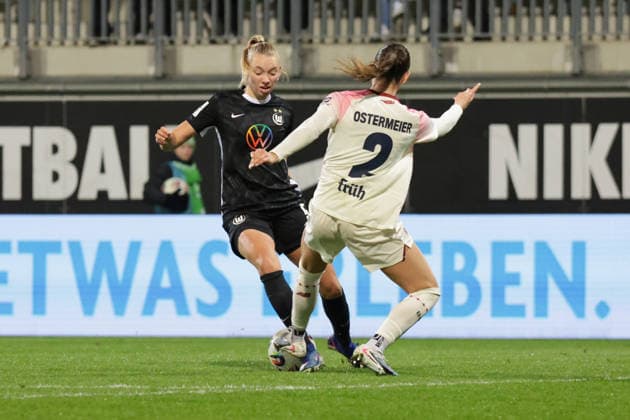 15.03.2026, xgrfx, Fussball Google Pixel Frauen-Bundesliga, VfL Wolfsburg - Bayer Leverkusen v.l. Ella Peddemors (VfL Wolfsburg), Selina Ostermeier (Bayer Leverkusen) (DFL DFB REGULATIONS PROHIBIT ANY USE OF PHOTOGRAPHS as IMAGE SEQUENCES and or QUASI-VIDEO) Wolfsburg