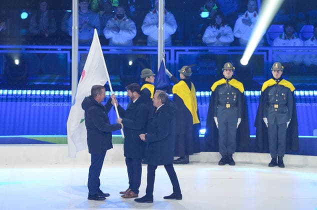 (260316) -- CORTINA D AMPEZZO, March 16, 2026 -- This photo taken on March 15, 2026 shows the handover of the Paralympic flag during the closing ceremony of Milan-Cortina 2026 Paralympic Winter games, Winterspiele,Spiele, Summer games in Cortina D ampezzo, Italy. ) (SP)ITALY-CORTINA D AMPEZZO-PARALYMPIC WINTER GAMES-CLOSING CEREMONY WangxKaiyan 