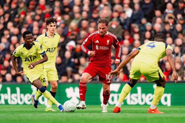 Liverpool v Tottenham Hotspur - Premier League Alexis Mac Allister of Liverpool in action with Tottenham Hotspur s Kevin Danso and Pape Matar Sarr during the Premier League match between Liverpool and Tottenham Hotspur at Anfield, Liverpool, on March 15, 2026. Liverpool Merseyside  Copyright: xMIxNewsx originalFilename:fletcher-liverpoo260315_npIhd.jpg