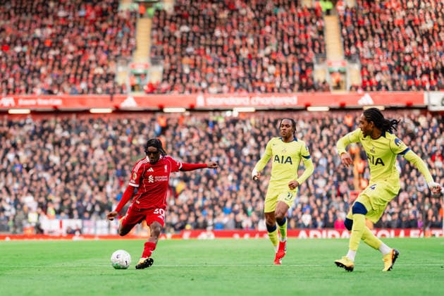 Liverpool v Tottenham Hotspur - Premier League Jeremie Frimpong of Liverpool in action with Tottenham Hotspur s Mathys Tel during the Premier League match between Liverpool and Tottenham Hotspur at Anfield, Liverpool, on March 15, 2026. Liverpool Merseyside  Copyright: xMIxNewsx originalFilename:fletcher-liverpoo260315_nplIC.jpg