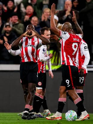 BRENTFORD, ENGLAND - MARCH 16: Michael Kayode of Brentford celebrates after scoring his team s first goal during the Premier League match between Brentford and Wolverhampton Wanderers at Gtech Community Stadium on March 16, 2026 in Brentford, England.  Copyright: xRenexNijhuis MBxMediax