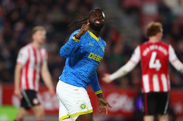 London, England, 16th March 2026. Tolu Arokodare of Wolverhampton Wanderers celebrates after scoring to make it 2-2 during the Brentford vs Wolverhampton Wanderers Premier League match at Gtech Community Stadium, London. Picture credit should read: Paul Terry Sportimage EDITORIAL USE ONLY. No use with unauthorised audio, video, data, fixture lists, club league logos or live services. Online in-match use limited to 120 images, no video emulation. No use in betting, games or single club league player publications. SPI_039_PT_Brentford_Wolves SPI-4606-0039