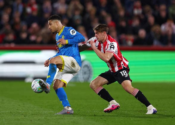 16th March 2026; Gtech Community Stadium, Brentford, London, England; Premier League Football, Brentford versus Wolverhampton Wanderers; Joao Gomes of Wolverhampton Wanderers under pressure from Yehor Yarmoliuk of Brentford  JPxFletcher Content restricted for UK based newspaper