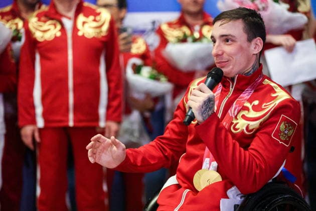 RUSSIA, MOSCOW - MARCH 17, 2026: Para cross-country skier Ivan Golubkov is seen during a welcoming ceremony for Russian athletes returning home after the 2026 Winter Paralympic Games, at Moscow’s Vnukovo International Airport. The Russian team scored third in the overall medal standings, bringing home the total of 12 medals (8 gold, 1 silver and 3 bronze). Yevgeny Messman TASS  90153614