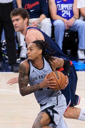 March 16, 2026, Inglewood, California, USA: Devin Vassell 24 of the San Antonio Spurs drives as Brook Lopez 11 of the Los Angeles Clippers defends during their regular season NBA, Basketball Herren, USA game on Monday March 16, 2026 at Intuit Dome in Inglewood, California. Clippers lose to Spurs, 119-115. ARIANA RUIZ PI Inglewood USA - ZUMAp124 20260316_zaa_p124_050 Copyright: xArianaxRuizx