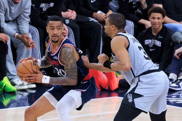 March 16, 2026, Inglewood, California, USA: Keldon Johnson 3 of the San Antonio Spurs guards John Collins 20 of the Los Angeles Clippers during their regular season NBA, Basketball Herren, USA game on Monday March 16, 2026 at Intuit Dome in Inglewood, California. Clippers lose to Spurs, 119-115. ARIANA RUIZ PI Inglewood USA - ZUMAp124 20260316_zaa_p124_051 Copyright: xArianaxRuizx