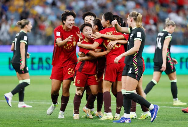 (260317) -- PERTH, March 17, 2026 -- Zhang Linyan (2nd L, front) of China celebrates with teammates after scoring a penalty during the semifinal of Women s Asian Cup between China and Australia at Perth Stadium in Perth, Australia, March 17, 2026. ) (SP)AUSTRALIA-PERTH-FOOTBALL-WOMEN S ASIAN CUP-SEMIFINAL-CHN VS AUS MaxPing 