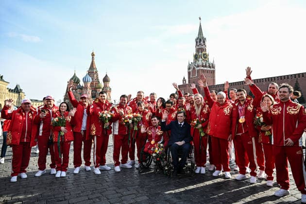 Russia Paralympics 2026 Athletes Honouring 9125594 17.03.2026 Members of Russian Paralympic team pose for a group photo during a ceremony honouring Russian athletes who took part in the Milano Cortina 2026 Winter Paralympic Games in the Red Square, in Moscow, Russia. Sergey Bobylev Sputnik Moscow Russia  Copyright: xSergeyxBobylevx