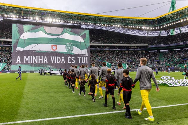260317 Players of Bodo Glimt enters the pitch ahead of the UEFA Champions League football match between Sporting CP and Bodo Glimt on March 17, 2026 in Lisbon. Photo: Marius Simensen BILDBYRAN COP 238 MM0063 bbeng football fotball fotboll soccer uefa champions league mesterligaen bodo glimt sporting clube de portugal sporting lisboa sporting lisbon sporting cp Copyright: MARIUSxSIMENSEN BB260317BB725