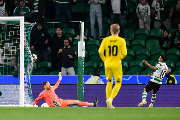 260317 Goalkeeper Nikita Haikin of Bodo Glimt and Geny Catamo of Sporting during the UEFA Champions League football match between Sporting CP and Bodo Glimt on March 17, 2026 in Lisbon. Photo: Marius Simensen BILDBYRAN COP 238 MM0063 bbeng football fotball fotboll soccer uefa champions league mesterligaen bodo glimt sporting clube de portugal sporting lisboa sporting lisbon sporting cp Copyright: MARIUSxSIMENSEN BB260317BB768