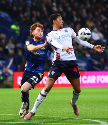 Jack Senior of Doncaster Rovers and Mason Burstow of Bolton Wanderers Bolton Wanderers v Doncaster Rovers, Sky Bet League One, Football, Toughsheet Community Stadium, Bolton, UK - 17 Mar 2026Bolton Toughsheet Community Stadium United Kingdom EDITORIAL USE ONLY No use with unauthorised audio, video, data, fixture lists, club league logos or live services. Online in-match use limited to 120 images, no video emulation. No use in betting, games or single club league player publications. Copyright: xPaulxCurrie Shutterstockx 16776367aa