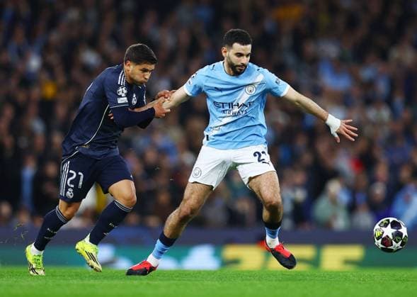 Brahim Diaz of Real Madrid and Rayan Ait-Nouri of Manchester City Manchester City v Real Madrid, UEFA Champions League, Round of 16, Second Leg, Football, Etihad Stadium, Manchester, UK - 17 Mar 2026Manchester Etihad Stadium United Kingdom EDITORIAL USE ONLY No use with unauthorised audio, video, data, fixture lists, club league logos or live services. Online in-match use limited to 120 images, no video emulation. No use in betting, games or single club league player publications. Copyright: xMattxWest Shutterstockx 16776379s