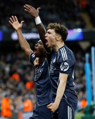 Manchester, England, 17th March 2026. Vinicius Junior of Real Madrid celebrates scoring the first goal from the penalty spot during the Manchester City vs Real Madrid UEFA Champions League round of 16 match at the Etihad Stadium, Manchester. Picture credit should read: Cody Froggatt Sportimage EDITORIAL USE ONLY. No use with unauthorised audio, video, data, fixture lists, club league logos or live services. Online in-match use limited to 120 images, no video emulation. No use in betting, games or single club league player publications. SPI_025_CF_ManCity_Madrid SPI-4612-0050