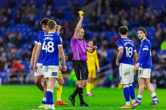 Cardiff City v Wycombe Wanderers, EFL Sky Bet League 1 YELLOW CARD Cardiff City midfielder Alex Robertson (18) is shown a yellow card by referee Carl Brook during the EFL Sky Bet League 1 match between Cardiff City and Wycombe Wanderers at the Cardiff City Stadium, Cardiff, UK on 17 March 2026. Cardiff Cardiff City Stadium South Glamorgan UK Editorial use only DataCo restrictions apply See www.football-dataco.com , Copyright: xDanxMintox PSI-23913-0013