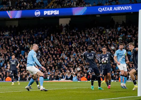 Manchester, England, 17th March 2026. Erling Haaland of Manchester City scores during the Manchester City vs Real Madrid UEFA Champions League round of 16 match at the Etihad Stadium, Manchester. Picture credit should read: Andrew Yates Sportimage EDITORIAL USE ONLY. No use with unauthorised audio, video, data, fixture lists, club league logos or live services. Online in-match use limited to 120 images, no video emulation. No use in betting, games or single club league player publications. SPI_037_AY_ManCity_Madrid SPI-4612-0066