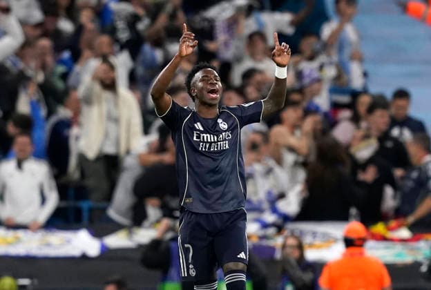 Manchester, England, 17th March 2026. Vinicius Junior of Real Madrid celebrates the first goal during the Manchester City vs Real Madrid UEFA Champions League round of 16 match at the Etihad Stadium, Manchester. Picture credit should read: Andrew Yates Sportimage EDITORIAL USE ONLY. No use with unauthorised audio, video, data, fixture lists, club league logos or live services. Online in-match use limited to 120 images, no video emulation. No use in betting, games or single club league player publications. SPI_035_AY_ManCity_Madrid SPI-4612-0068