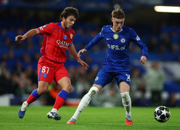 London, England, 17th March 2026. Joao Neves of Paris Saint-Germain and Cole Palmer of Chelsea challenge for the ball during the Chelsea vs Paris Saint Germain UEFA Champions League round of 16 match at Stamford Bridge, London. Picture credit should read: Paul Terry Sportimage EDITORIAL USE ONLY. No use with unauthorised audio, video, data, fixture lists, club league logos or live services. Online in-match use limited to 120 images, no video emulation. No use in betting, games or single club league player publications. SPI_041_PT_Chelsea_PSG SPI-4610-0040