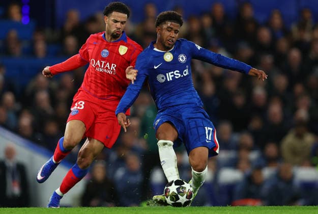 London, England, 17th March 2026. Warren Zaire-Emery of Paris Saint-Germain and Andrey Santos of Chelsea challenge for the ball during the Chelsea vs Paris Saint Germain UEFA Champions League round of 16 match at Stamford Bridge, London. Picture credit should read: Paul Terry Sportimage EDITORIAL USE ONLY. No use with unauthorised audio, video, data, fixture lists, club league logos or live services. Online in-match use limited to 120 images, no video emulation. No use in betting, games or single club league player publications. SPI_045_PT_Chelsea_PSG SPI-4610-0044