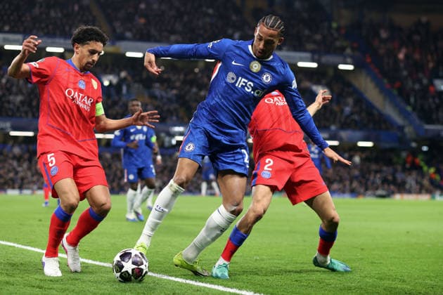 Chelsea v PSG 17 March 2026, London - UEFA Champions League, Round of Sixteen, 2nd Leg - Chelsea v Paris Saint-Germain - Joao Pedro of Chelsea goes down under pressure from Marquinhos and Achraf Hakimi of PSG - Photo: Charlotte Wilson Offside. London UK Copyright: xCharlottexWilsonx xOffsidexOffside