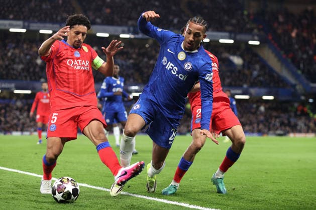Chelsea v PSG 17 March 2026, London - UEFA Champions League, Round of Sixteen, 2nd Leg - Chelsea v Paris Saint-Germain - Joao Pedro of Chelsea goes down under pressure from Marquinhos and Achraf Hakimi of PSG - Photo: Charlotte Wilson Offside. London UK Copyright: xCharlottexWilsonx xOffsidexOffside