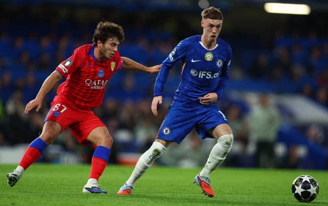 London, England, 17th March 2026.Joao Neves of Paris Saint-Germain and Cole Palmer of Chelsea challenge for the ball during the Chelsea vs Paris Saint Germain UEFA Champions League round of 16 match at Stamford Bridge, London. Picture credit should read: Paul Terry Sportimage EDITORIAL USE ONLY. No use with unauthorised audio, video, data, fixture lists, club league logos or live services. Online in-match use limited to 120 images, no video emulation. No use in betting, games or single club league player publications. SPI_048_PT_Chelsea_PSG SPI-4610-0047