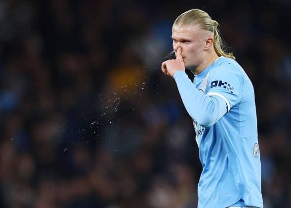 Erling Haaland of Manchester City clears their nose Manchester City v Real Madrid, UEFA Champions League, Round of 16, Second Leg, Football, Etihad Stadium, Manchester, UK - 17 Mar 2026Manchester Etihad Stadium United Kingdom EDITORIAL USE ONLY No use with unauthorised audio, video, data, fixture lists, club league logos or live services. Online in-match use limited to 120 images, no video emulation. No use in betting, games or single club league player publications. Copyright: xMattxWest Shutterstockx 16776379ai
