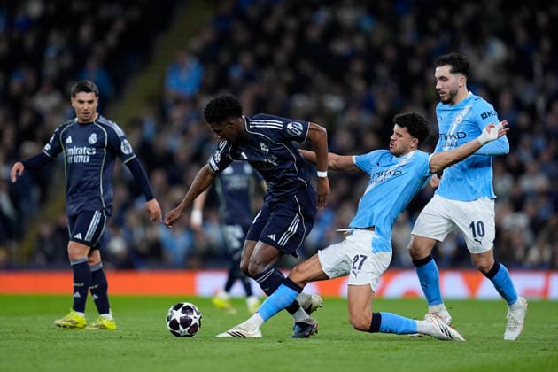 March 17, 2026, Manchester, Manchester, England: Aurelien Tchouameni of Real Madrid CF and Matheus Nunes of Manchester City in action during the UEFA Champions League 2025 26 Round of 16 Second Leg match between Manchester City and Real Madrid C.F. at Etihad Stadium on March 17, 2026, in Manchester, England. Manchester England - ZUMAa181 20260317_zaa_a181_206 Copyright: xDennisxAgyemanx