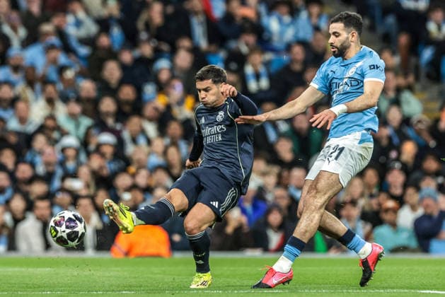 Manchester City FC v Real Madrid CF - UEFA Champions League 2025 26 Round of 16 Second Leg Brahim Diaz of Real Madrid shoots on goal under pressure from Rayan Ait-Nouri of Manchester City during the UEFA Champions League last 16 second leg match between Manchester City and Real Madrid at The City of Manchester Stadium in Manchester, United Kingdom, on March 17, 2026. Manchester Greater Manchester United, ManU Kingdom  Copyright: xNewsxImagesx originalFilename:cosgrove-uefacham260317_npAKf.jpg