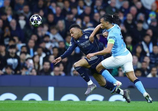 Kylian Mbappe of Real Madrid and Nathan Ake of Manchester City Manchester City v Real Madrid, UEFA Champions League, Round of 16, Second Leg, Football, Etihad Stadium, Manchester, UK - 17 Mar 2026Manchester Etihad Stadium United Kingdom EDITORIAL USE ONLY No use with unauthorised audio, video, data, fixture lists, club league logos or live services. Online in-match use limited to 120 images, no video emulation. No use in betting, games or single club league player publications. Copyright: xMattxWest Shutterstockx 16776379ba