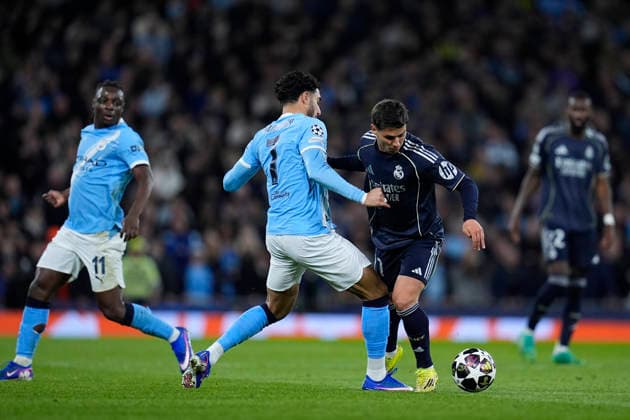 March 17, 2026, Manchester, Manchester, England: Brahim Diaz of Real Madrid CF and Omar Marmoush of Manchester City in action during the UEFA Champions League 2025 26 Round of 16 Second Leg match between Manchester City and Real Madrid C.F. at Etihad Stadium on March 17, 2026, in Manchester, England. Manchester City V Real Madrid C.F. - UEFA Champions League 2025 26 Round Of 16 Second Leg  - ZUMAa181 20260317_zaa_a181_221 Copyright: xDennisxAgyemanx